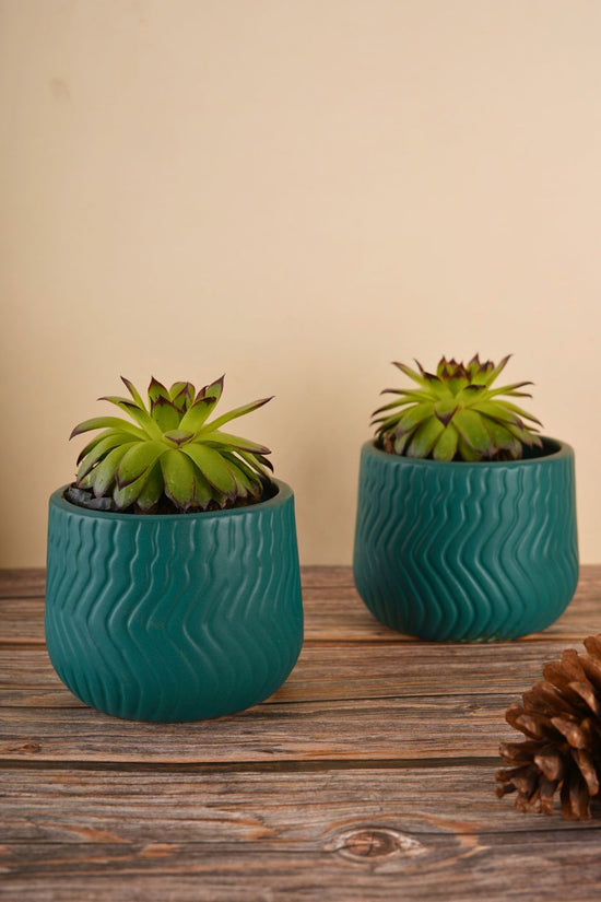 essential teal planter made by ceramic 