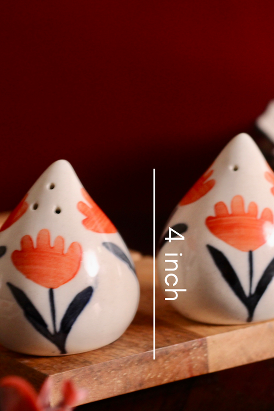 White & orange salt & pepper shakers