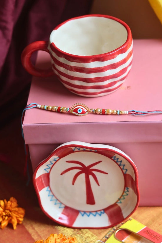 Red Lined Mug & Palm handmade Dessert Plate Rakhi Gift Box handmade in India