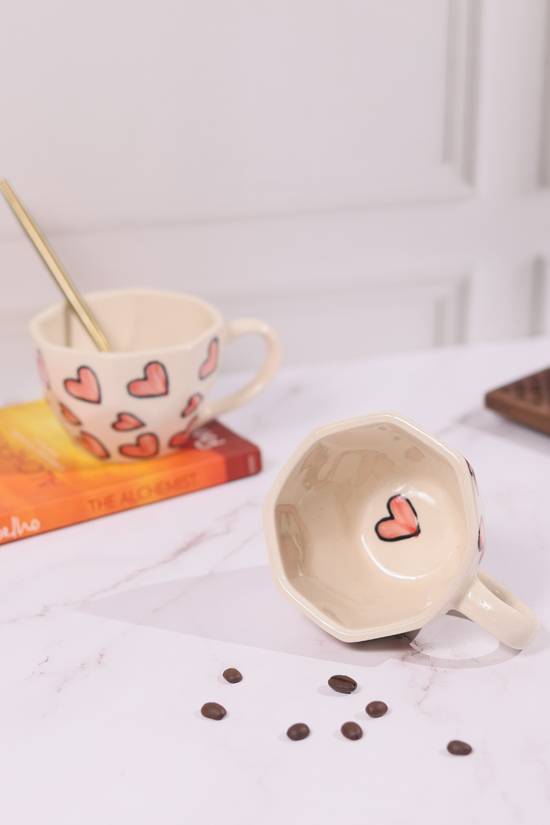 Pink heart inside the coffee mug