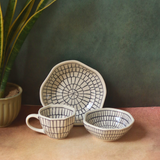 Black & white ceramic bowls & coffee mug