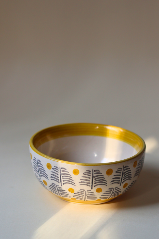 Ceramic bowl yellow white