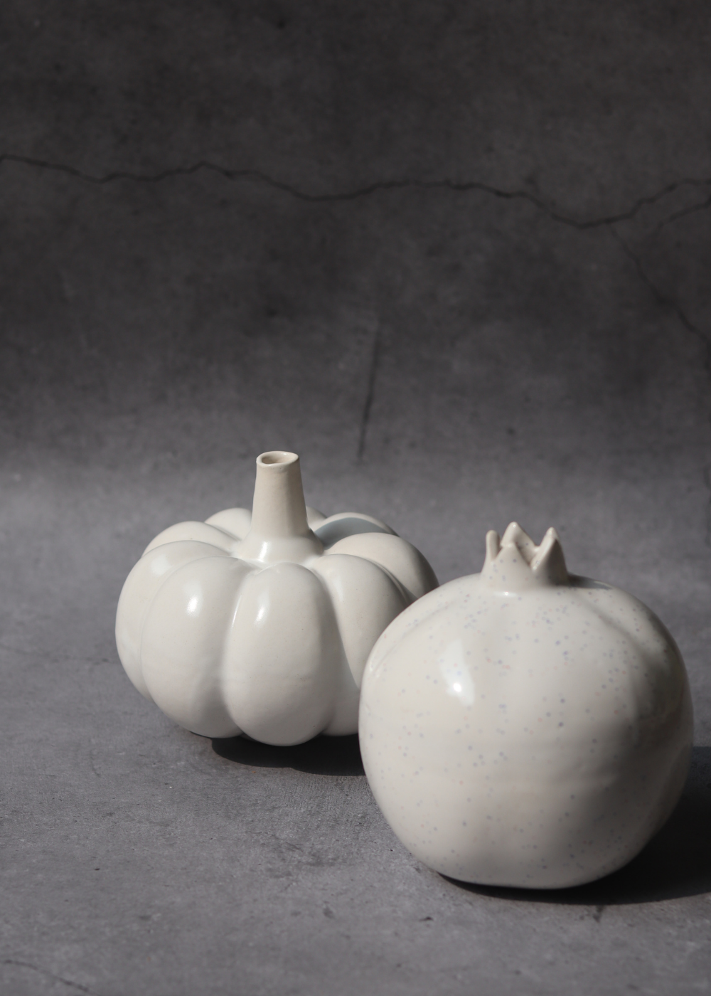 set of two white vases made by ceramic 