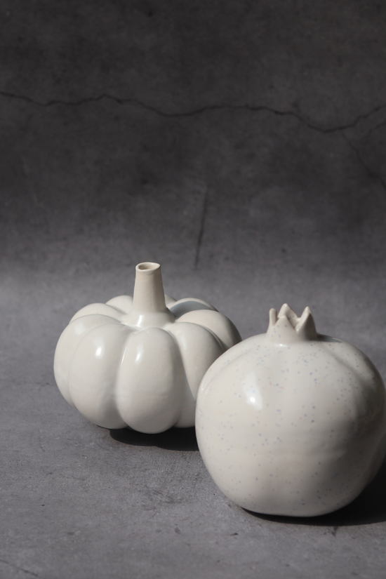 set of two white vases made by ceramic 