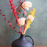 this vase with adorable flower bunch made with premium quality material