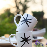 Black leaf mugs