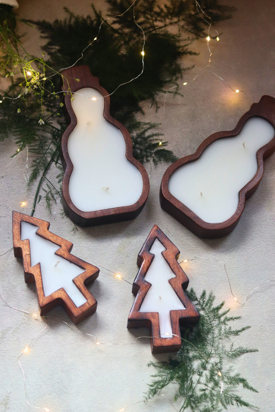 christmas tree and snowman candles for home decoration
