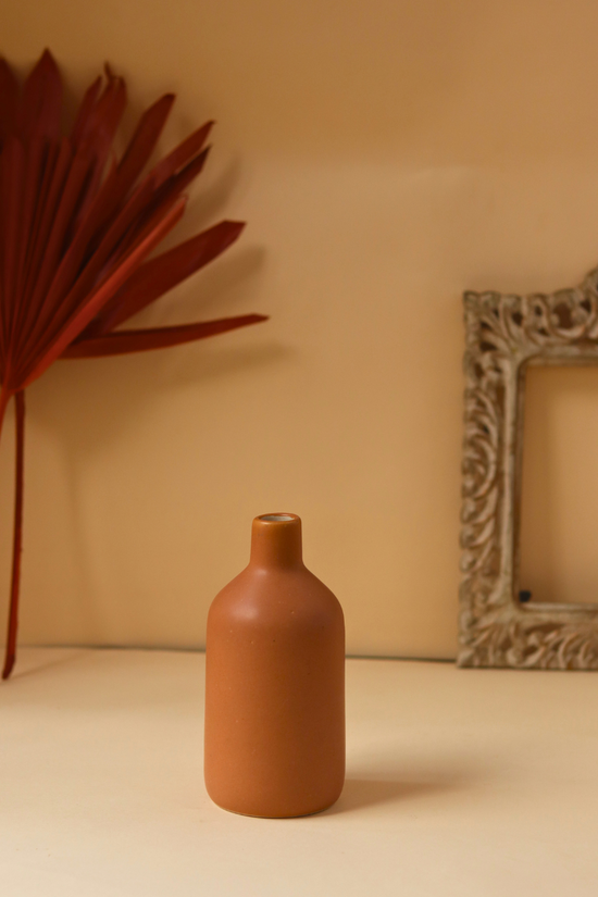 ceramic vase with rust color