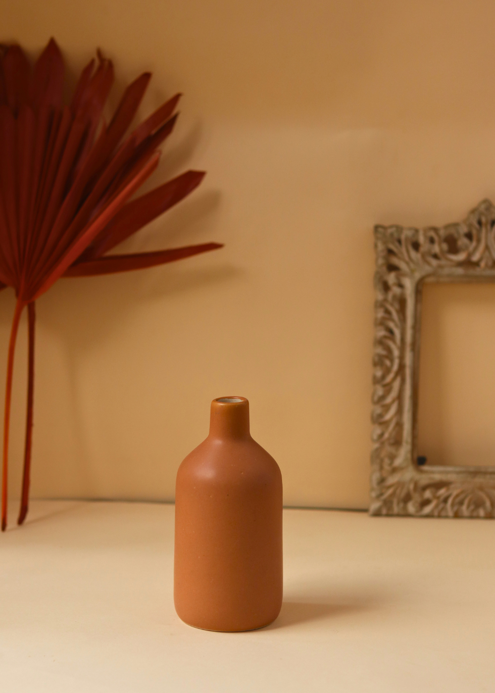 ceramic vase with rust color