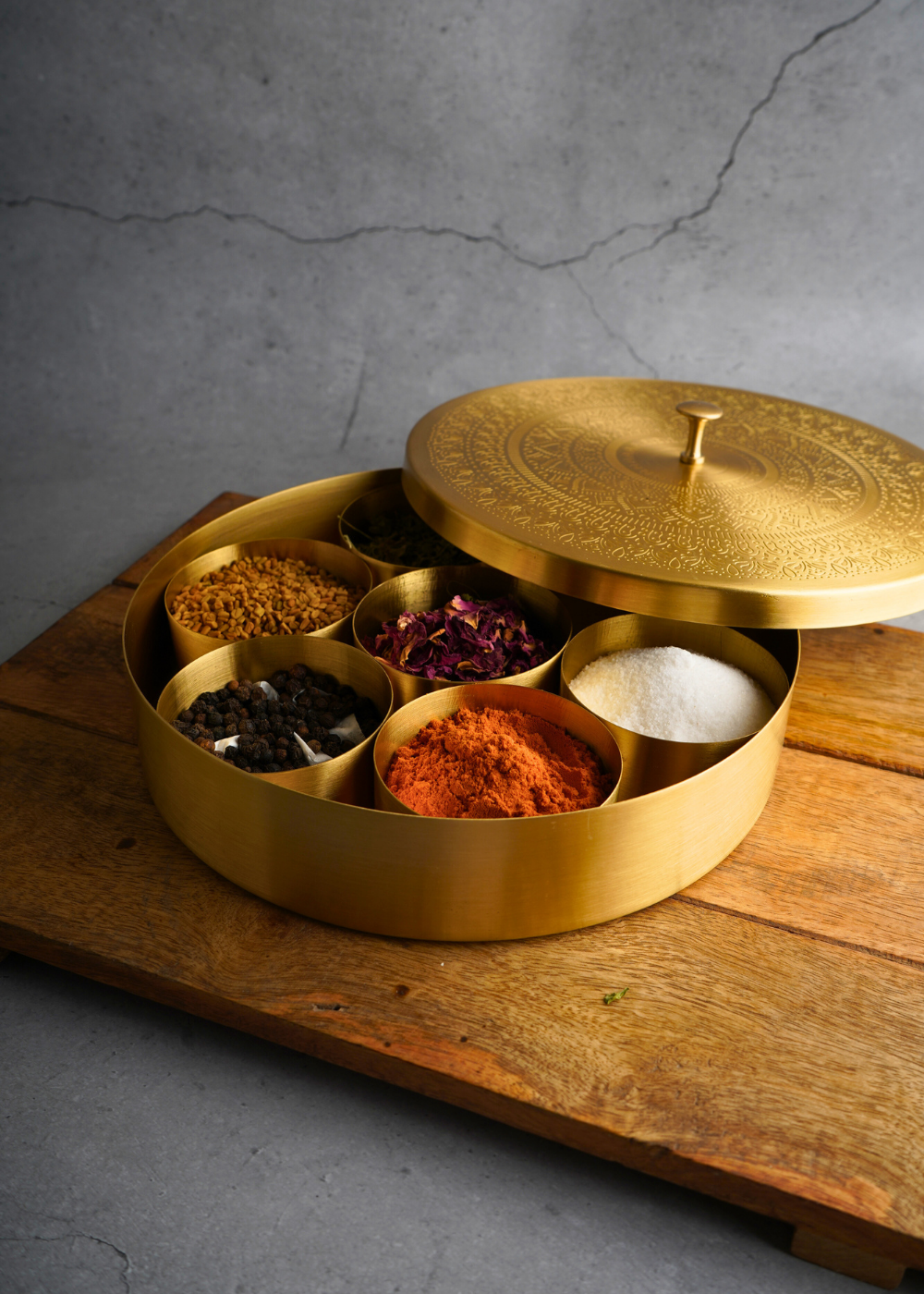 Spices box on wooden tray