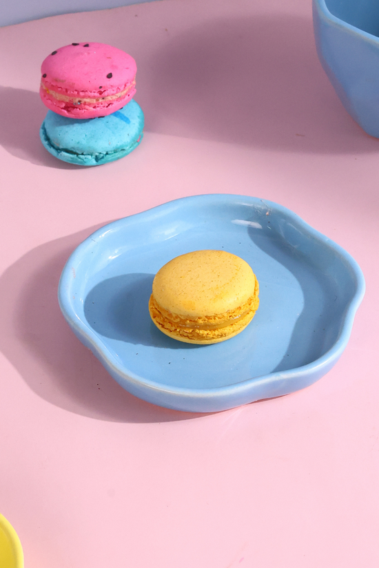 Handmade ceramic dessert plate with macarons