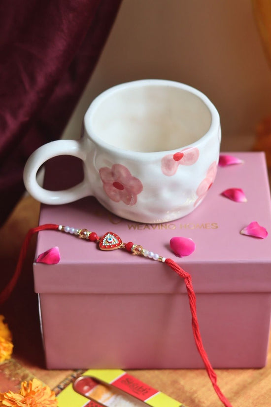 Floral Bliss Mug in a Gift box with Rakhi made by ceramic