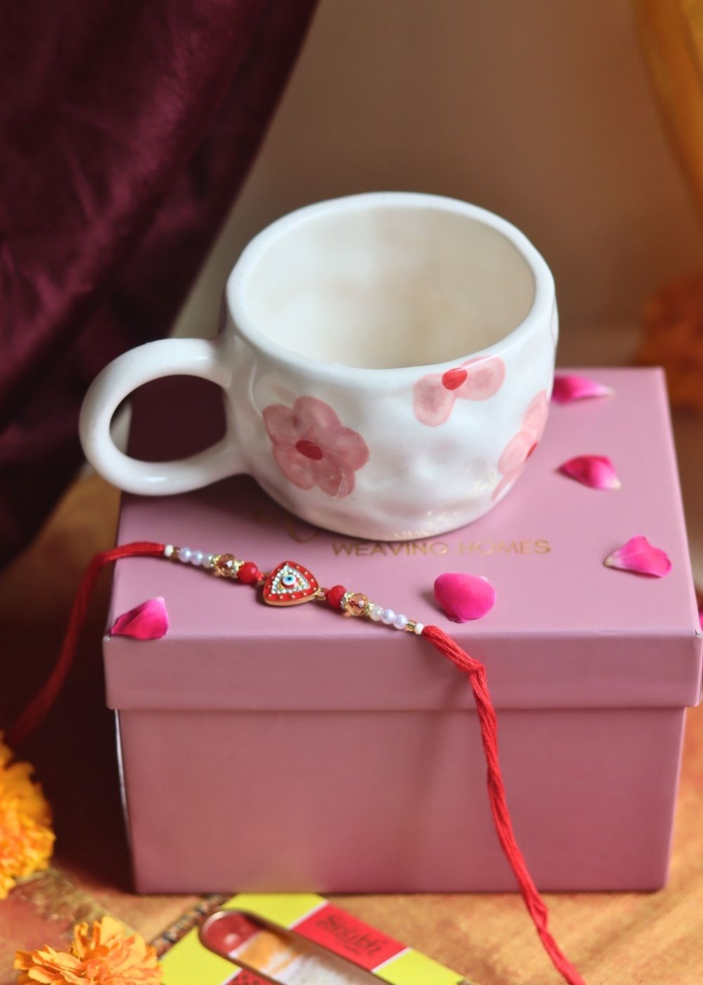 Floral Bliss Mug in a Gift box with Rakhi made by ceramic