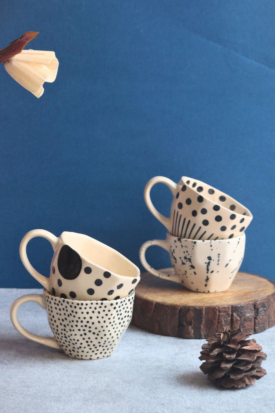 Set of 4 Black & White Mugs made by ceramic