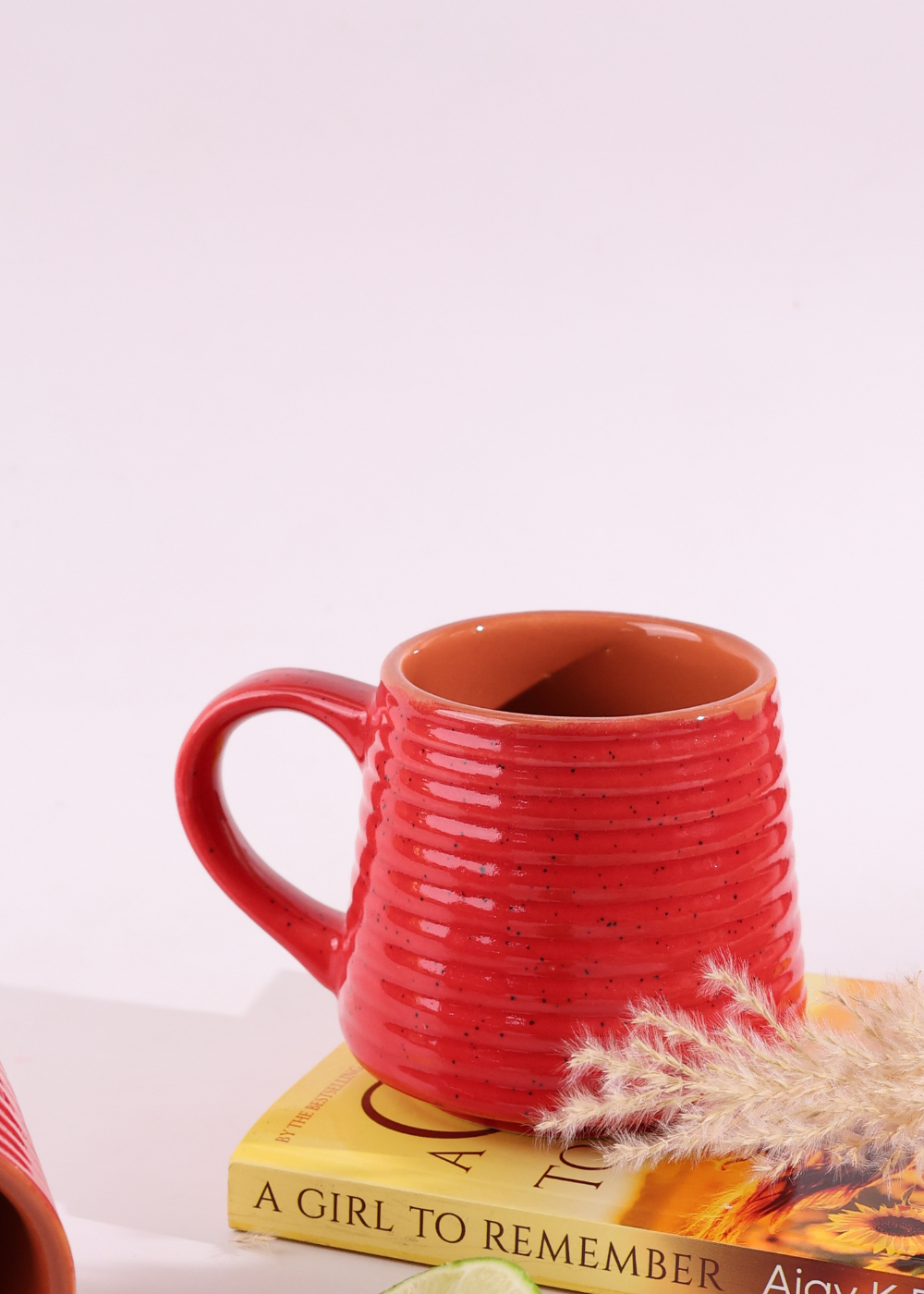 handmade red coffee mug with glossy red color...