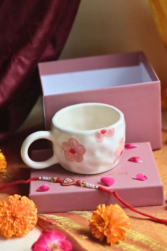 Floral Bliss Mug in a Gift box with Rakhi with premium quality material