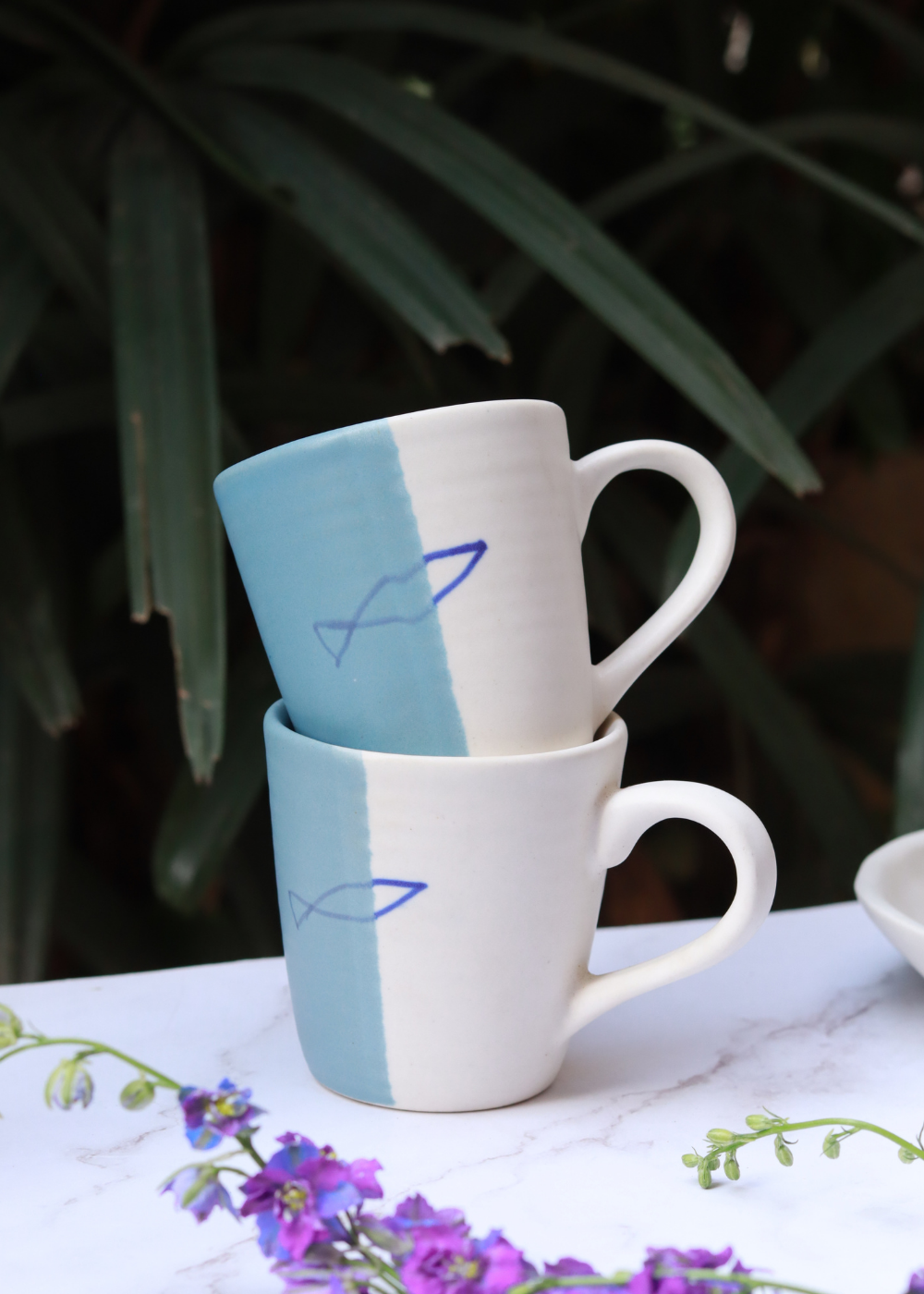 handmade coastal catch mugs made from ceramic 