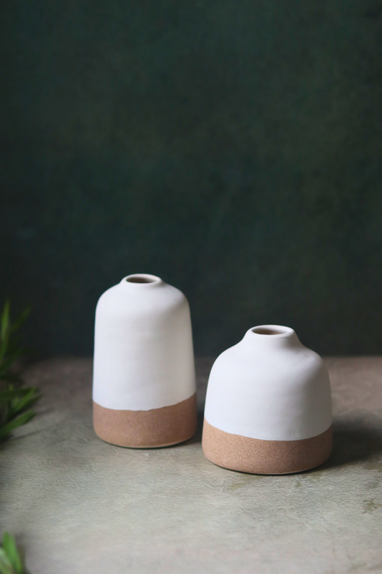 Two white & sanded bud vases 