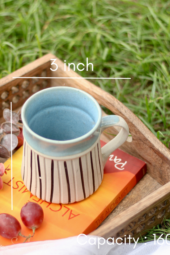 Handmade ceramic coffee mug height & breadth