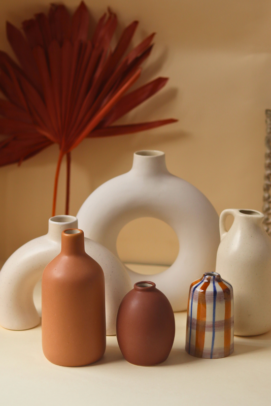 set of 6 vases with different designs