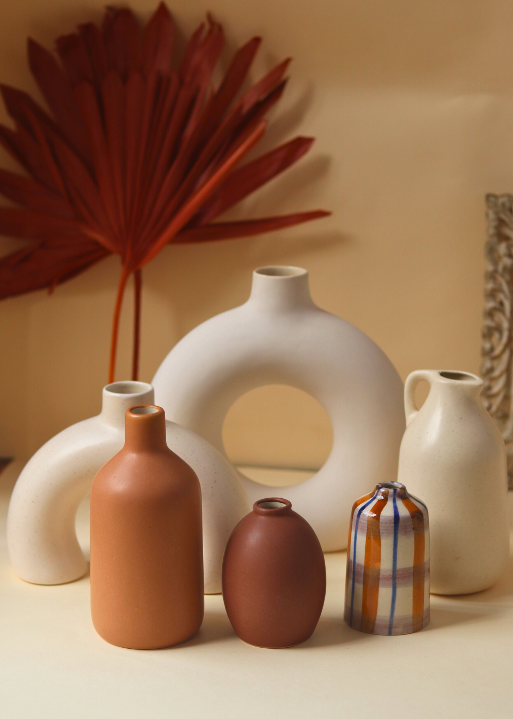 set of 6 vases with different designs
