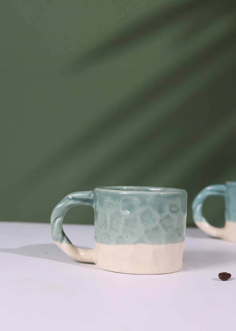 handmade teal handmoulded mug with teal & white color