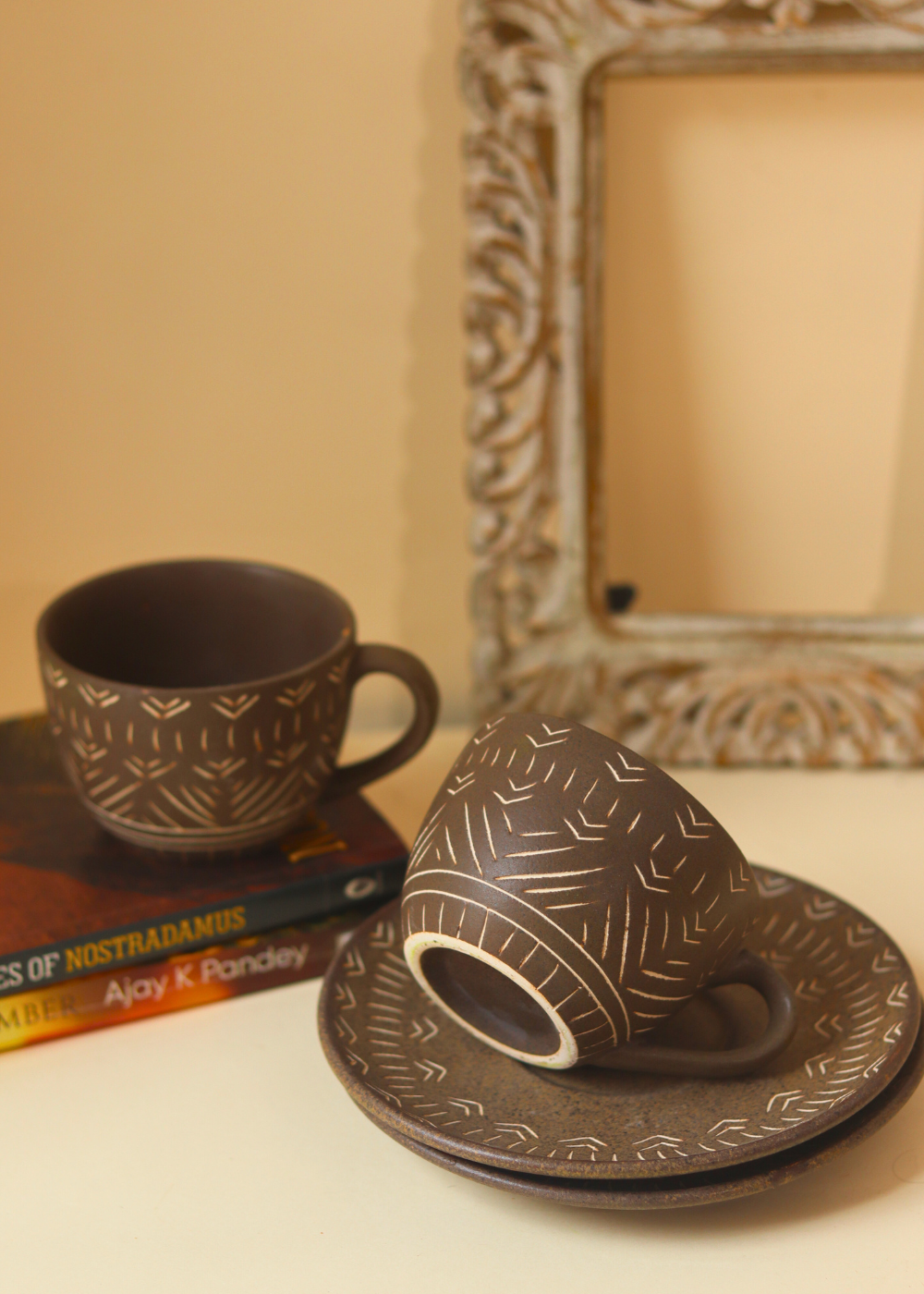 Drinkware brown carved cup and saucer