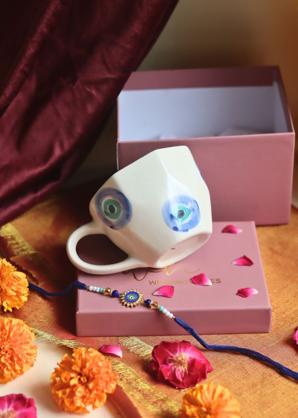 Evil Eye Mug in a Gift box with Rakhi made by ceramic