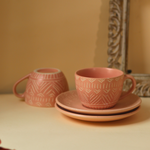 Handmade ceramic tea cup with saucer pink color