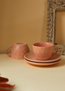 Handmade ceramic tea cup with saucer pink color