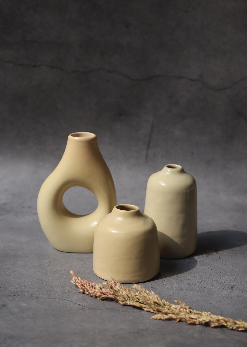 set of three cream vases made by ceramic 