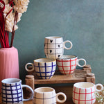 chequered mugs made by ceramic 