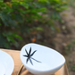 White bowl with black leaf print