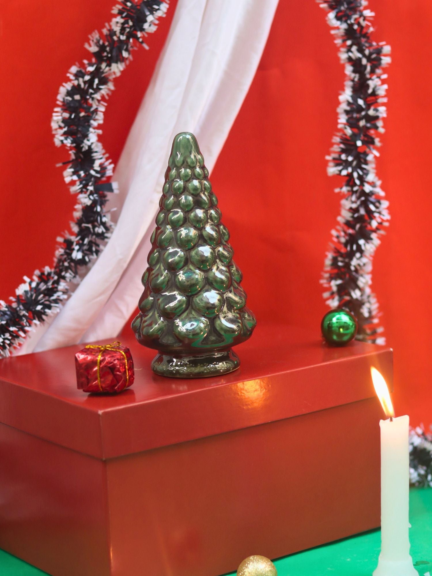 Green Pine Christmas tree in a Gift Box