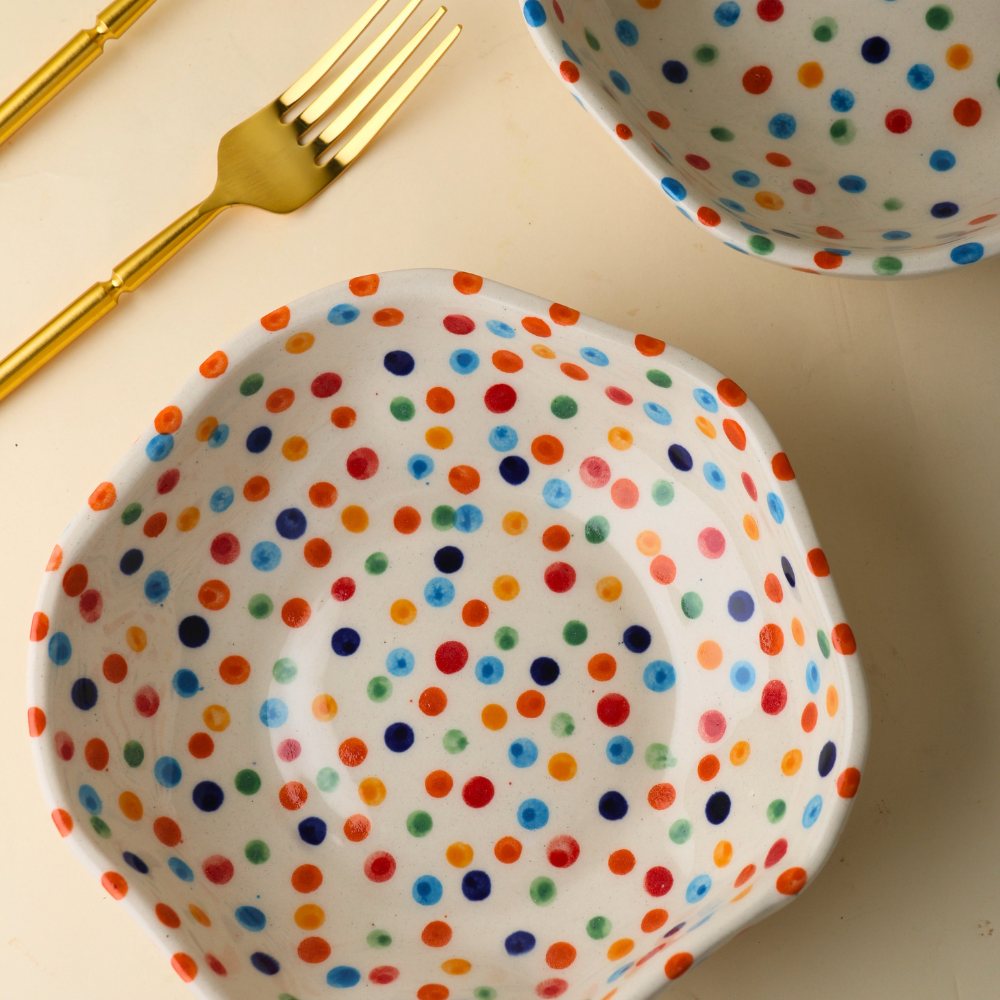 Colourful polka bowl with cutlery 