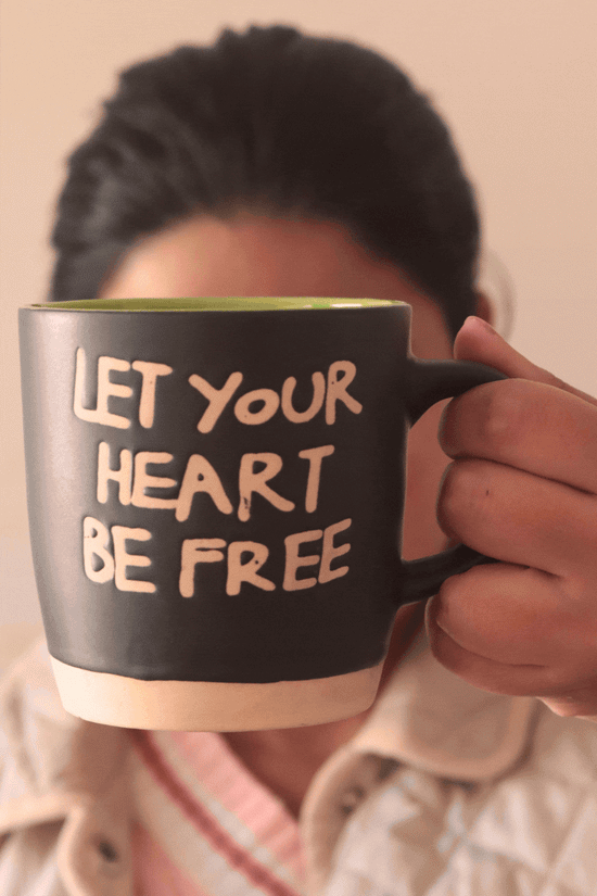 Let Your Heart Be Free Mug - Black for your morning coffee