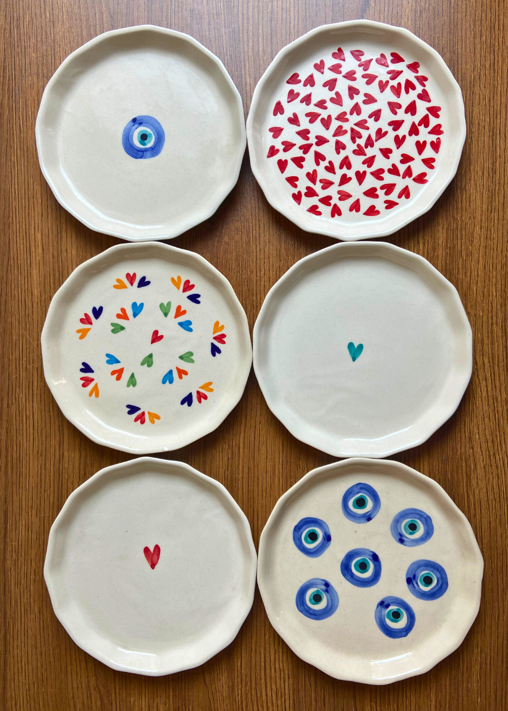hearts & evil eye snack plates made by ceramic