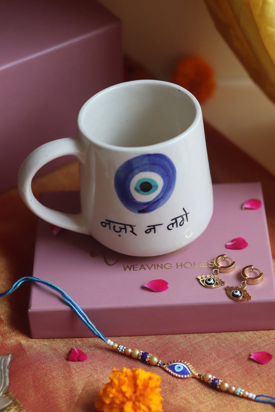 Rakhi Nazar Mug gift box with Rakhi & Earrings