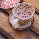 handmade red polka mug with dessert plate  