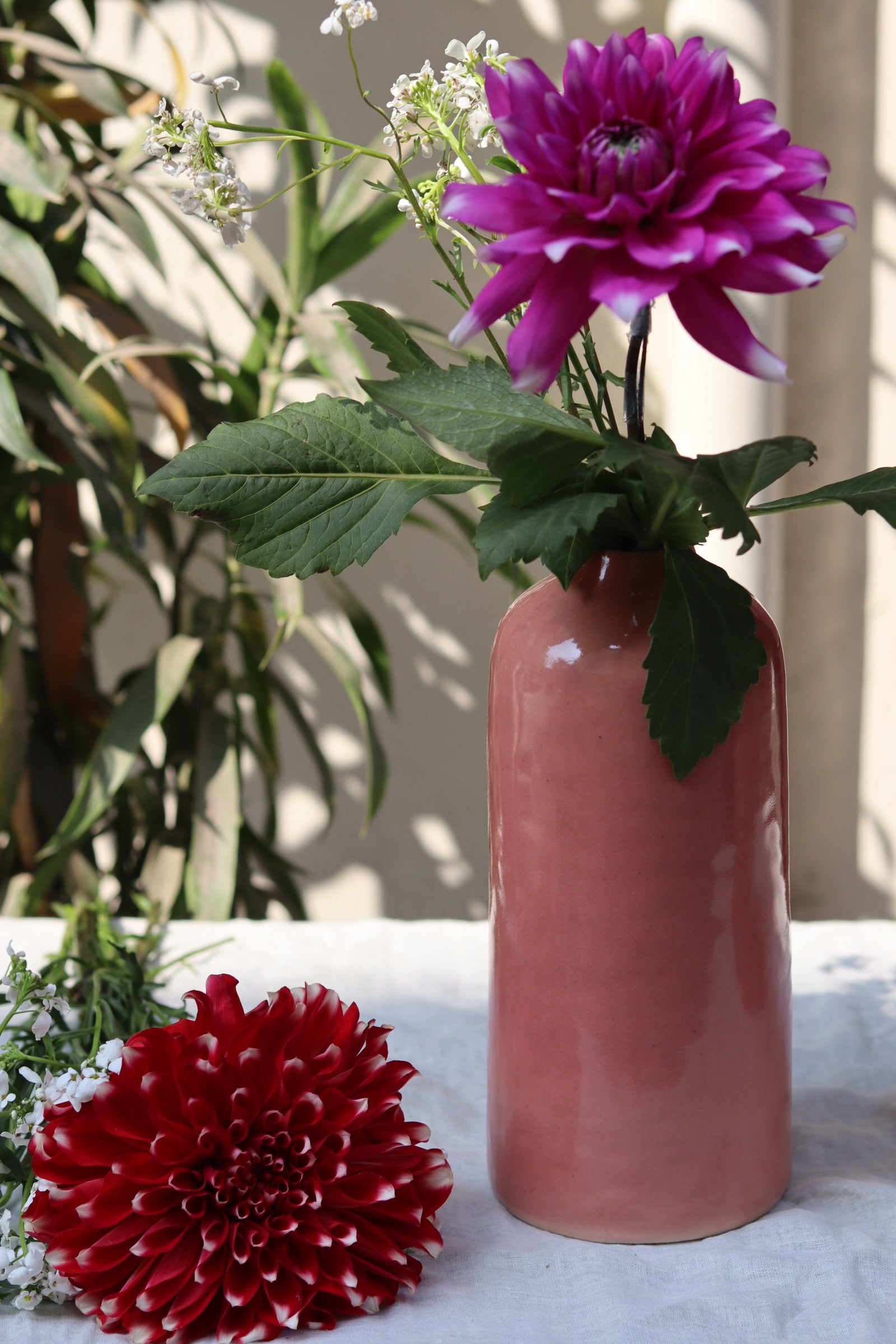 Handmade ceramic flower vase with flower
