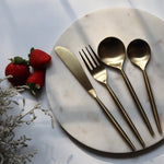 gold cutlery set of 4  