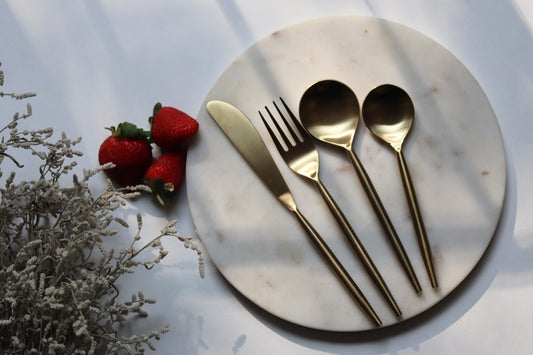 gold cutlery set of 4  