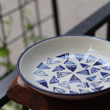 White & blue ceramic pasta plates