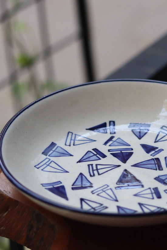 White & blue ceramic pasta plates
