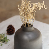 Black bud vase made by ceramic