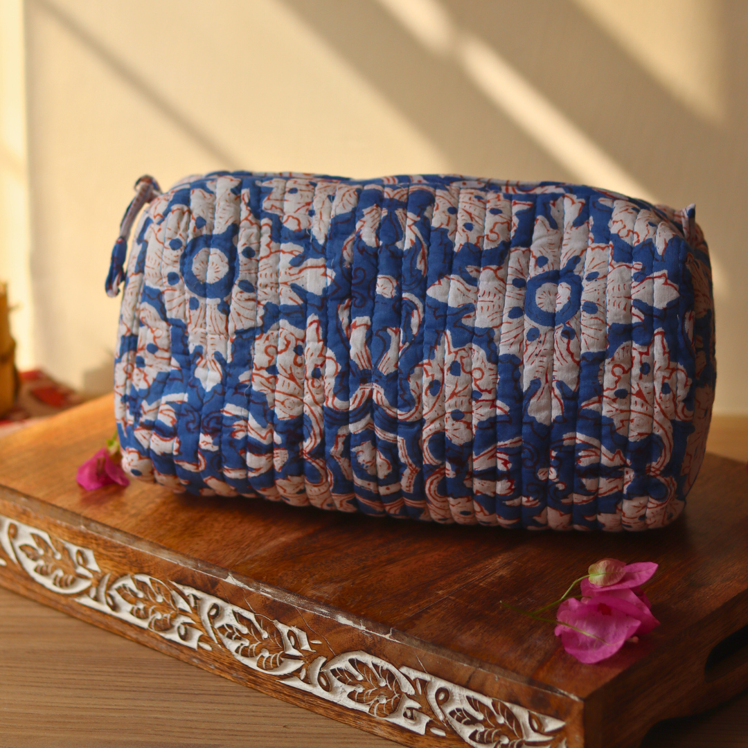 Floral toiletry bag on a wooden surface large