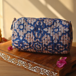 Floral toiletry bag on a wooden surface large