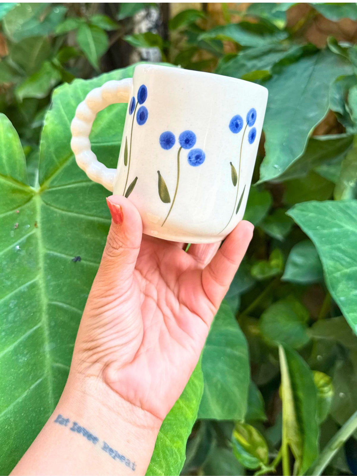 Blue Poppy Mug made by ceramic