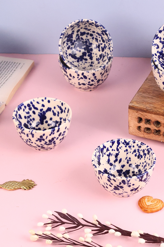 Blue flecked bowls with flower