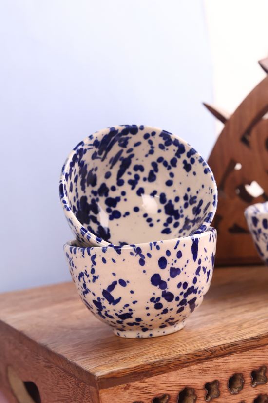 Blue flecked bowls on each other